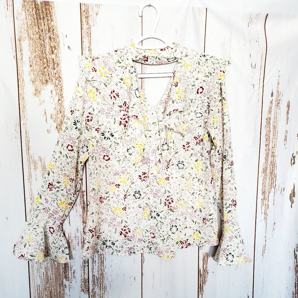 Floral ruffle blouse with bell sleeves